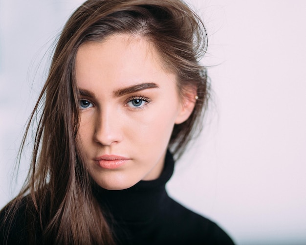 Premium Photo Close Up Portrait Of A Beautiful Asian Woman Against A Plain Background Premium Photo Close Up Portrait Of A Beautiful Asian Woman Against A Plain Background